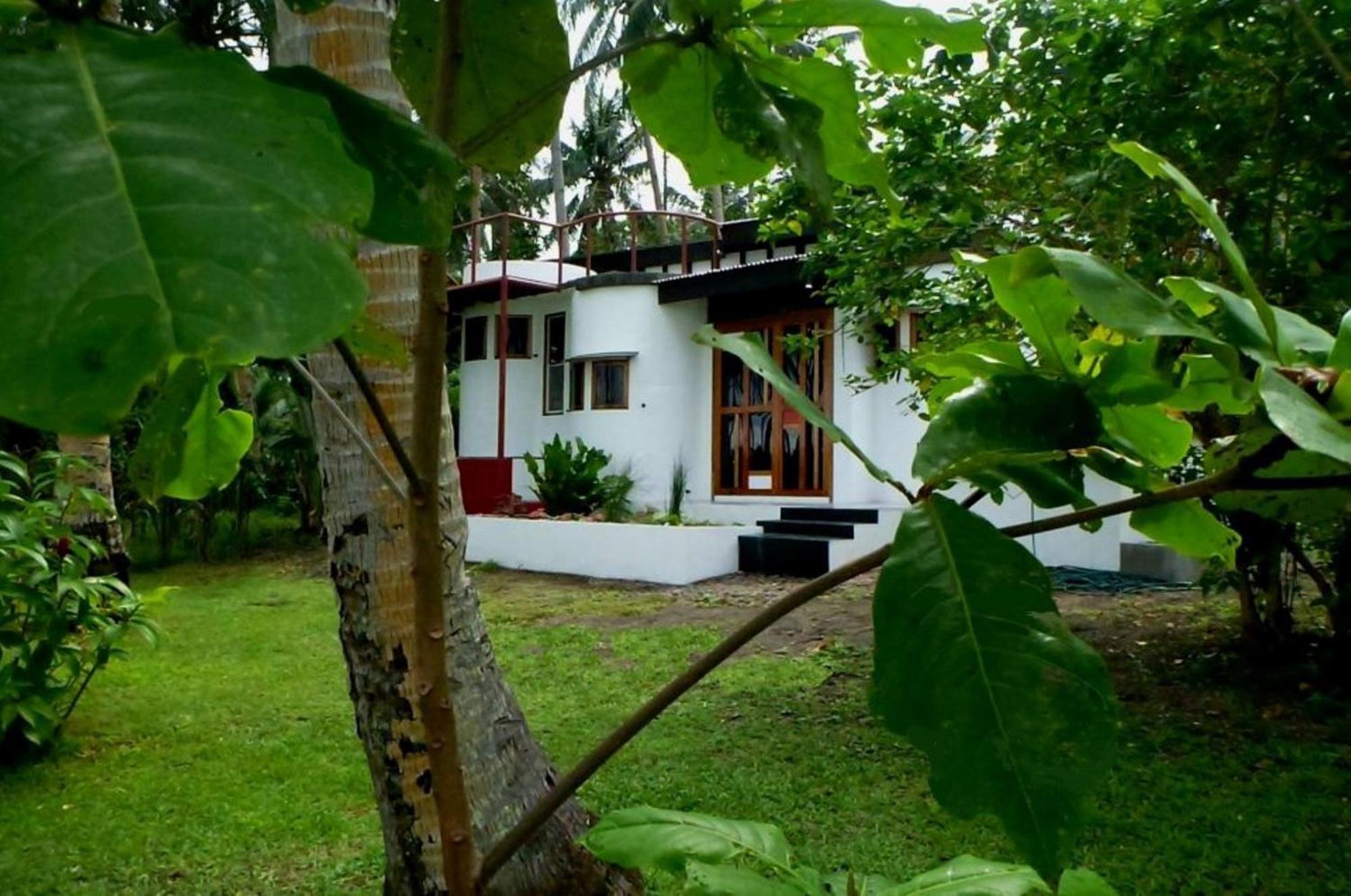 Somewhere Else Boutique Resort Мамбахао Экстерьер фото