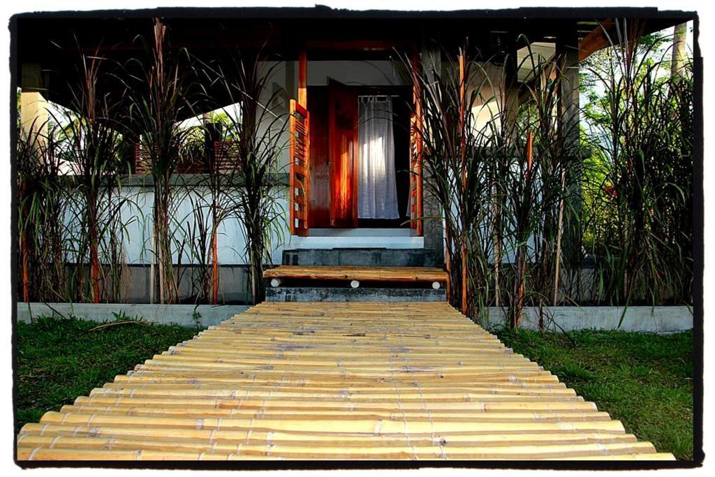 Somewhere Else Boutique Resort Мамбахао Номер фото