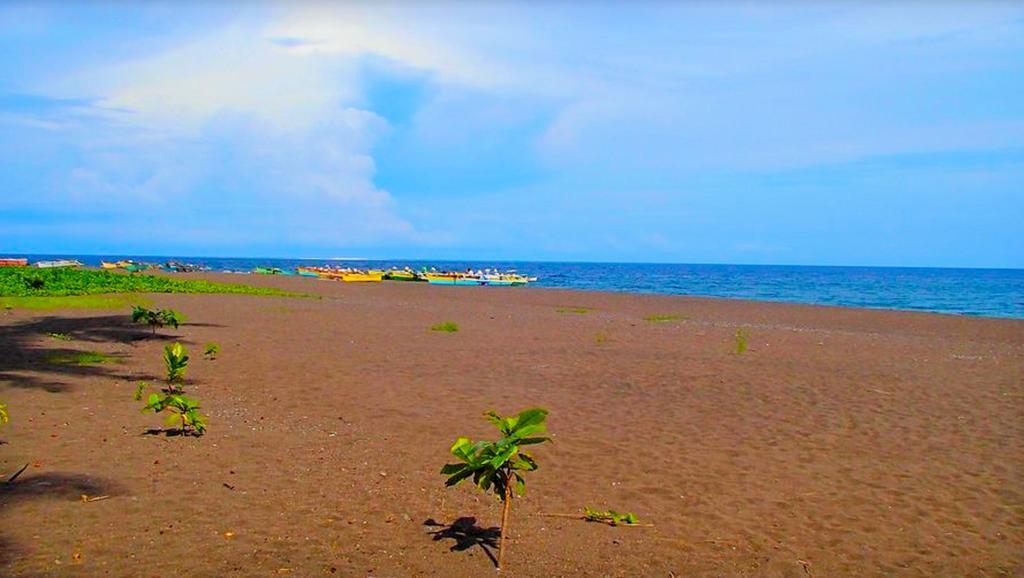 Somewhere Else Boutique Resort Мамбахао Экстерьер фото