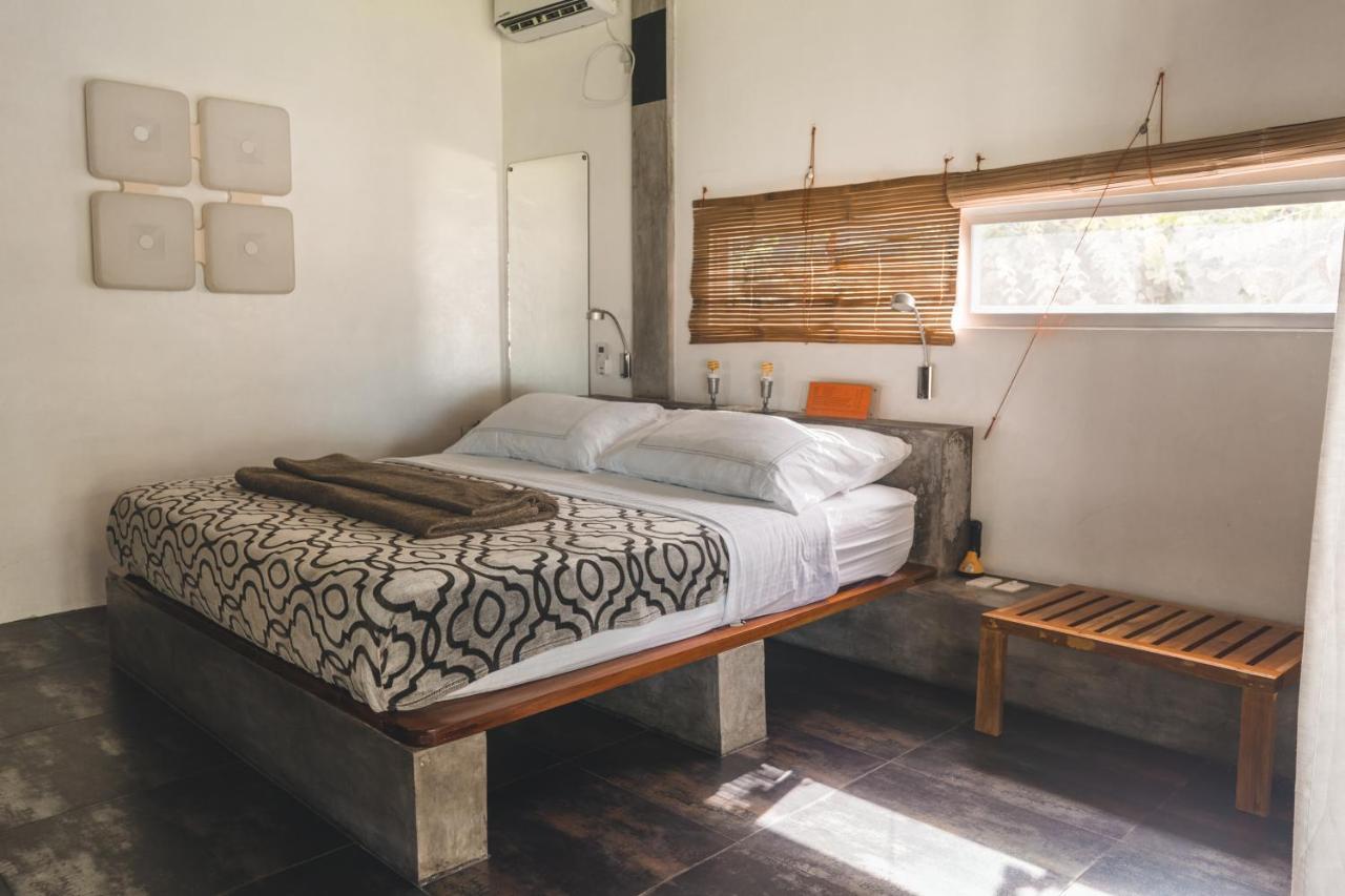 Somewhere Else Boutique Resort Мамбахао Экстерьер фото